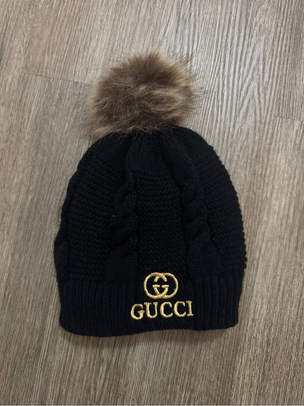 Black Knit Beanie with Brown Faux-Fur Pom and Gold Logo
